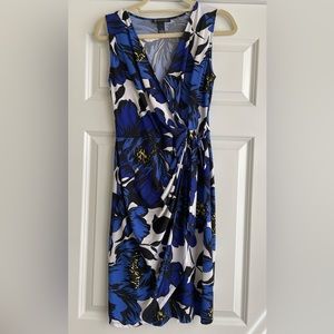 Gorgeous jersey knit faux wrap dress. Gently worn. Bold bright floral. Small